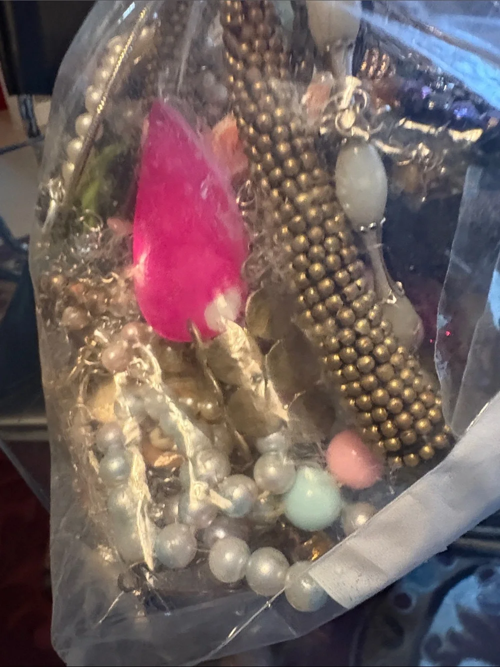 Wearable Jewelry in a bag with many different colors and designs LBS 3.14